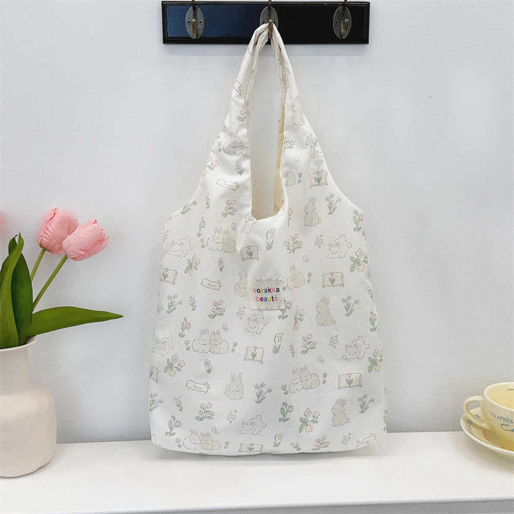 Korean Summer Embossed Canvas Tote Bag Cute Minimalist Design Large Capacity Shoulder Crossbody Bag for Women Trendy Small Batch Fashion Accessory