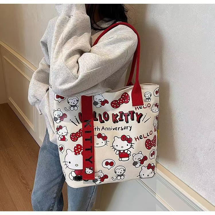 Korean Style Cute Hello Kitty Canvas Tote Bag for Women Fashionable Cartoon Printed Shoulder Bag Casual Office Commuting Crossbody Bag Lightweight Durable Everyday Use