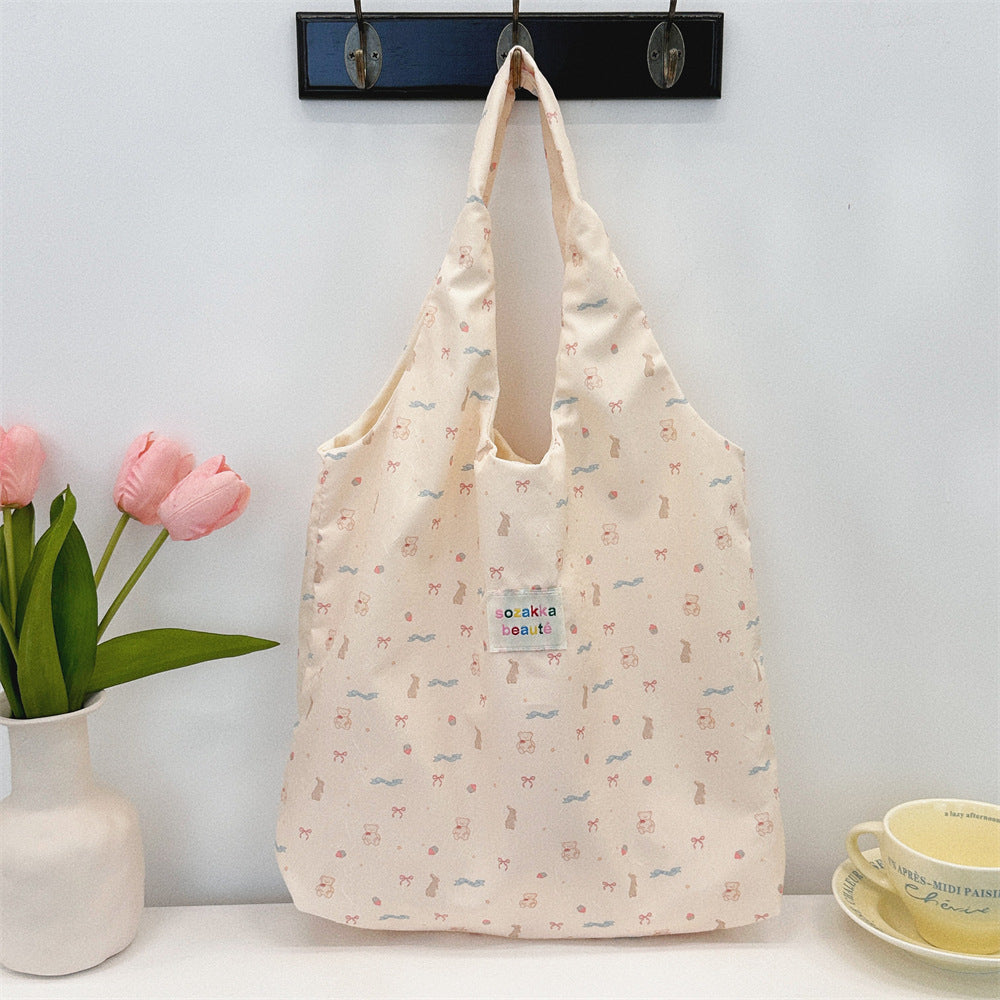Korean Summer Embossed Canvas Tote Bag Cute Minimalist Design Large Capacity Shoulder Crossbody Bag for Women Trendy Small Batch Fashion Accessory