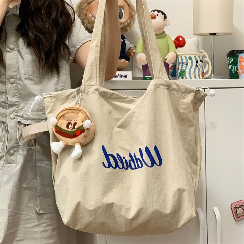 New Casual Canvas Tote Bag for Women Lightweight Drawstring Shoulder Bag Stylish Large Capacity Commuting Handbag Trendy Minimalist Everyday Use Fashionable Work School Travel Purse