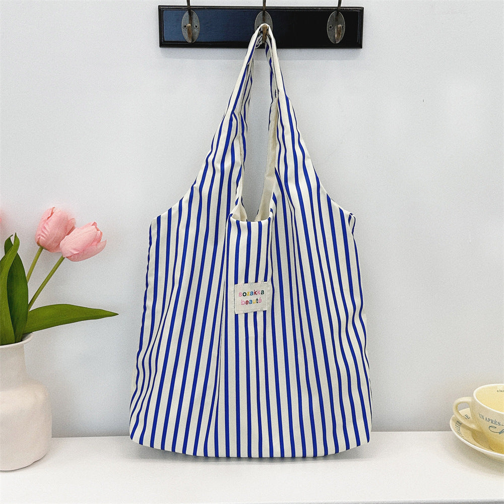 Korean Summer Embossed Canvas Tote Bag Cute Minimalist Design Large Capacity Shoulder Crossbody Bag for Women Trendy Small Batch Fashion Accessory